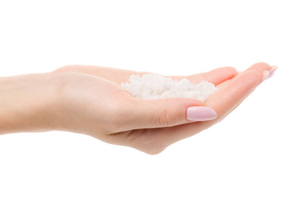 istock Sea salt in female hand 865826204