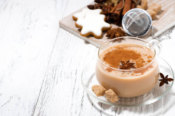 istock spicy masala tea and Christmas cookies on white background 865828952