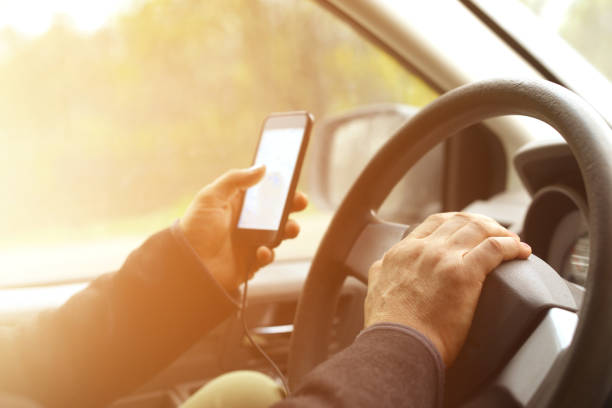istock Male hand holding mobile phone 865829020