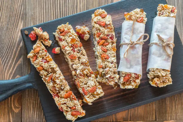 Homemade granola bars on the wooden board