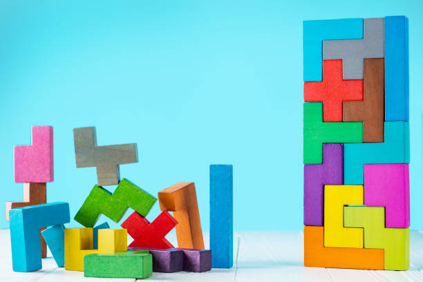 istock Logical tasks composed of colorful wooden shapes. 865832994