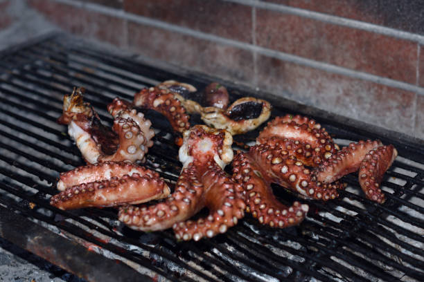 istock Pieces of a octopus on a gri 865836356