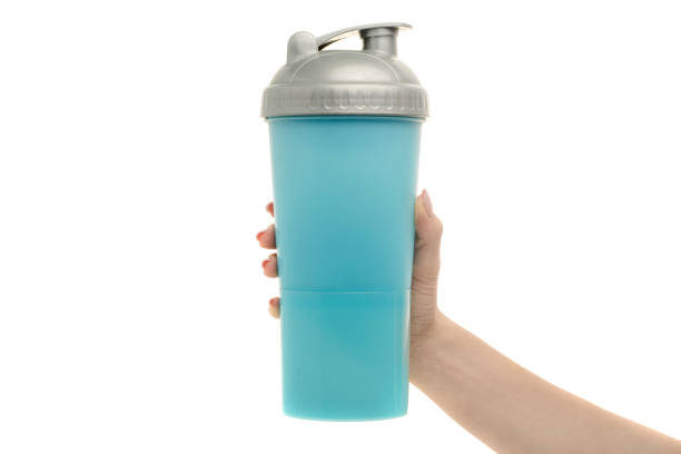 istock Blue sport shaker female hand 865836592