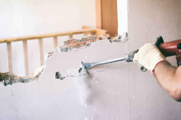 professional worker in construction site using jackhammer - craft craftsperson photography indoors imagens e fotografias de stock