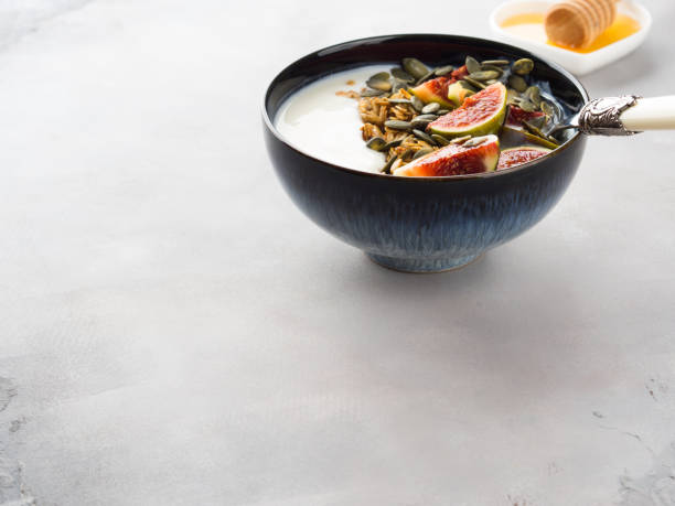 istock Healthy breakfast yogurt bowl with granola and fig 865840170