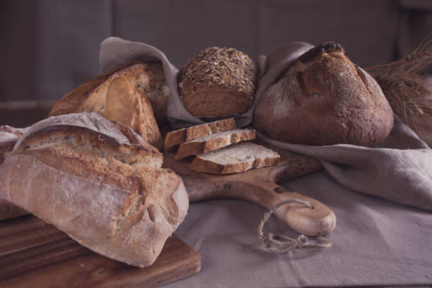 istock Assortment of homemade bread on the table 865840810
