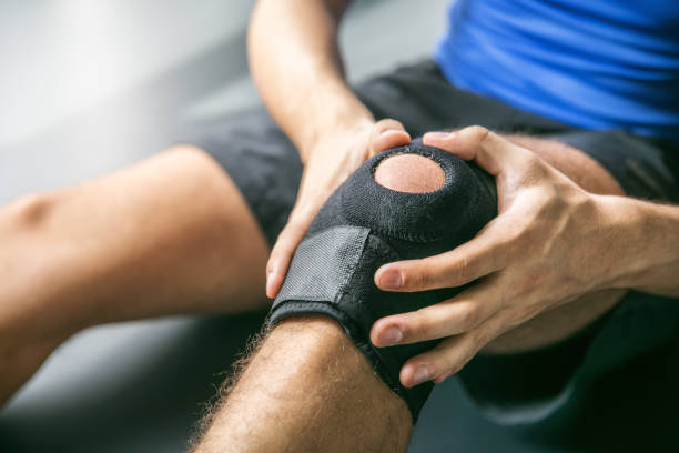 istock Sports injuries, bandaged knee 865844418