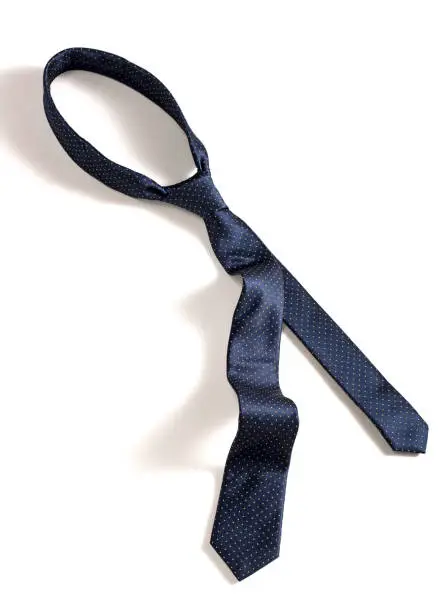 Dark blue necktie isolated on white background (with clipping path)