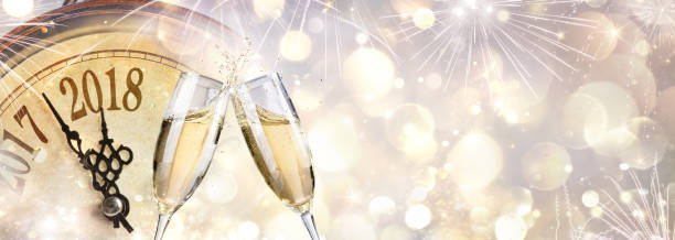 istock New Year 2018 - Toast With Champagne And Clock 865847650