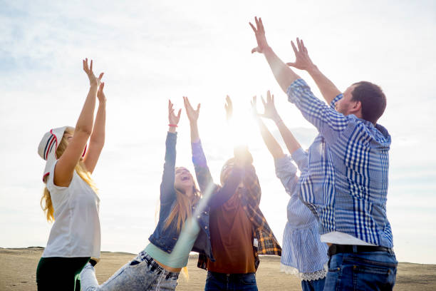 istock Friends playing volleyball 865856154