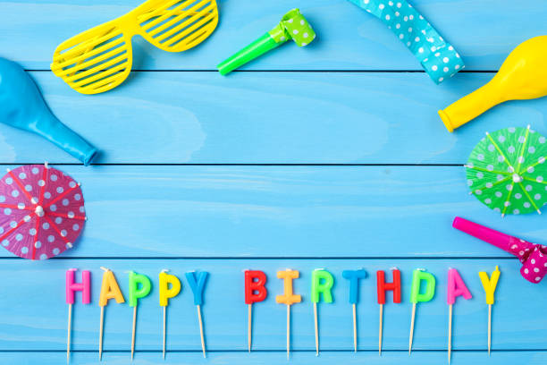 istock Birthday accessories on blue wooden background 865861292