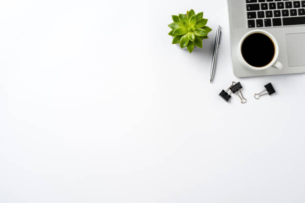 istock Overhead shot of office desktop with modern laptop and accessories 865862028
