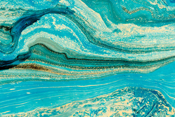 istock Modern artwork with abstract marble painting.   Mixed blue and yellow paints. Unusual handmade background for poster, card, invitation. Acrylic paints on water surface. Horizontal. 865867418