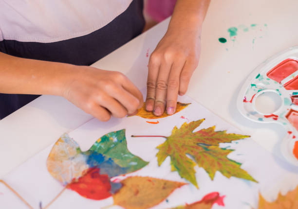 istock Children hands doing art and crafts 865867810