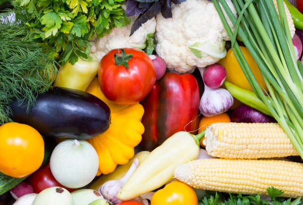 istock background of fresh vegetables and greens 865868458