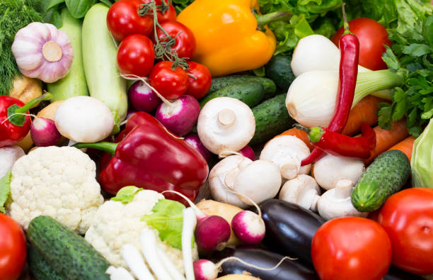 istock background of fresh vegetables and greens 865870586