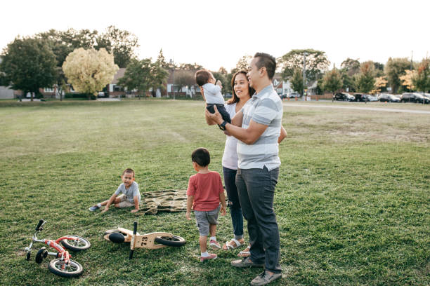 istock Family with three kids having fun 865872004