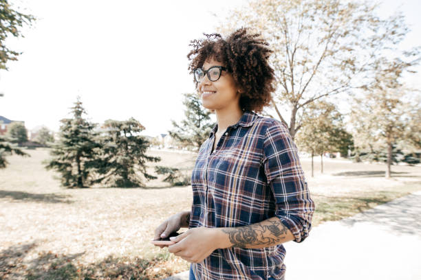 istock Teen with cellphone outdoor 865872288