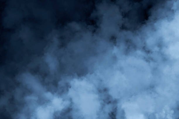 istock SMOKE ON BLACK BACKGROUND WITH MIDNIGHT BLUE TONE 865875728