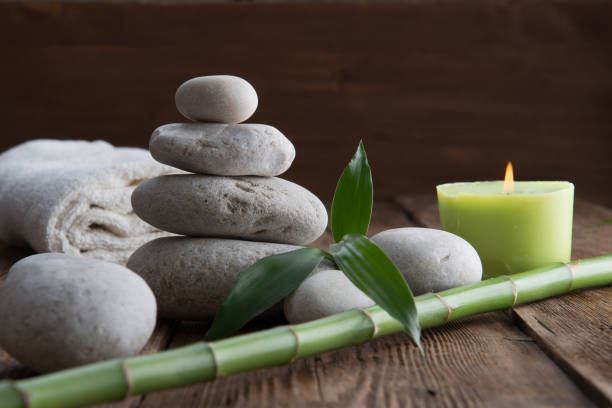 istock Stones hot stone, Orchid, bamboo and candle. Zen relaxation 865881500