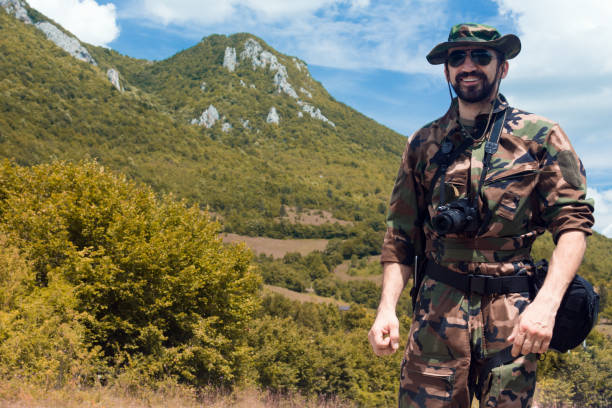 istock military man in nature 865882598