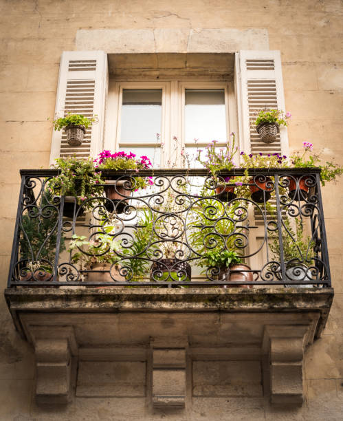 istock Mediterranean balcony full of colored flowers and plants. 865883846