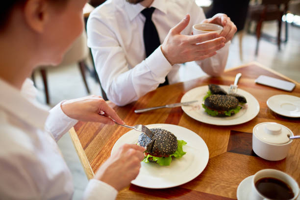 istock Chatting with Colleague at Lunchtime 865887658