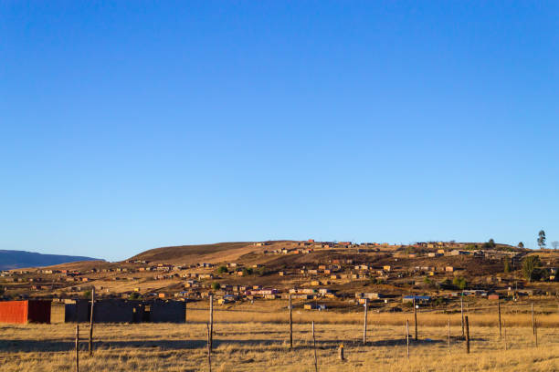 Shantytown to the road to Drakensberg District, South Africa. Poverty and decay