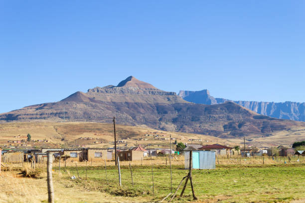 Shantytown to the road to Drakensberg District, South Africa. Poverty and decay