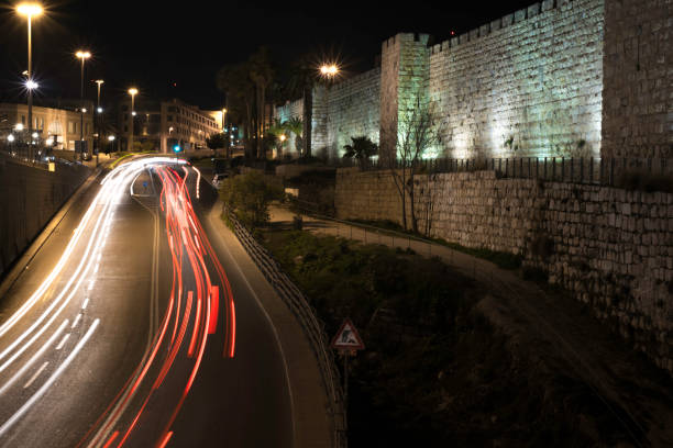 istock Jerusalem street at night with cars 865888664