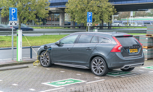 Hoofdorp, October 22th 2017: Volvo V60 Charging at parking, waiting for driver to come back