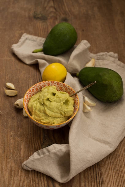 istock Avocado sauce in small bowl with etnic pattern 865896804