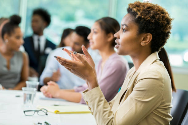 istock Serious young businesswoman participates in panel discussion 865902960