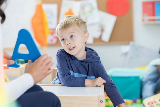 istock Cute preschool age boy learning the alphabet 865903166
