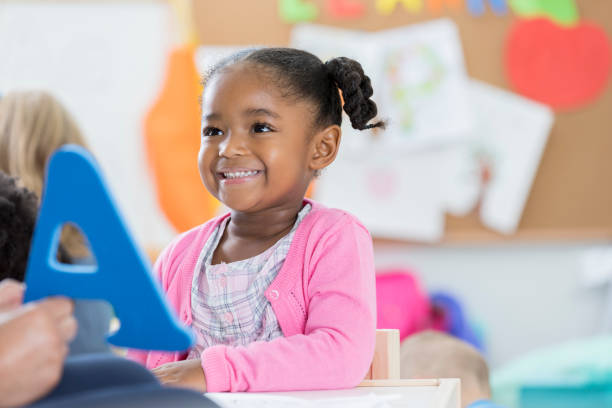 istock Cheerful toddler learning the alphabet 865903172