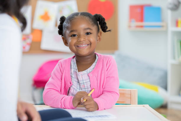istock Adorable toddler enjoying preschool 865903216