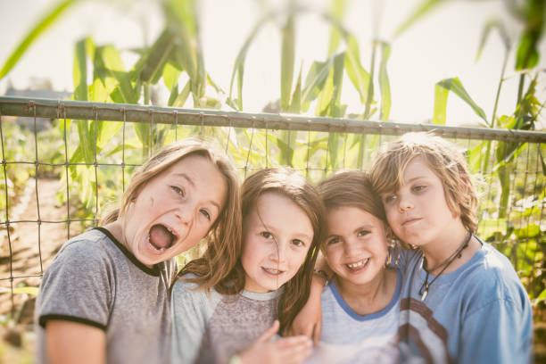 istock Children on a farm being silly 865903370