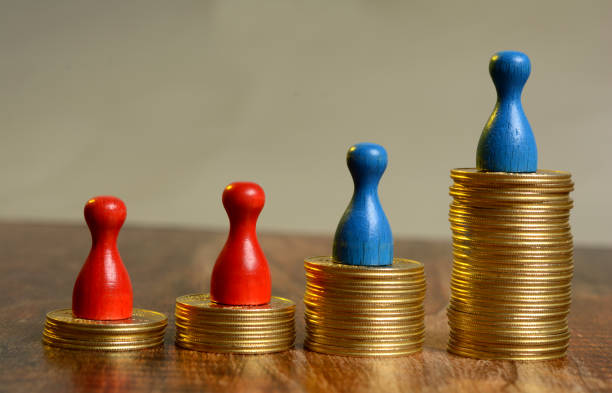 istock Stack of Golden Coins Graph going up with pawns 865903622