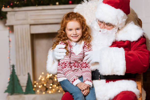 istock santa claus and kid 865906862