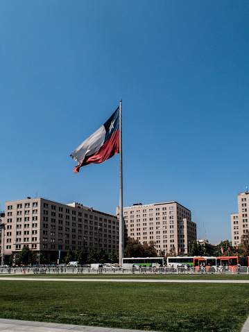 Big Chilean flag near La Moneda building in Santiago de Chile