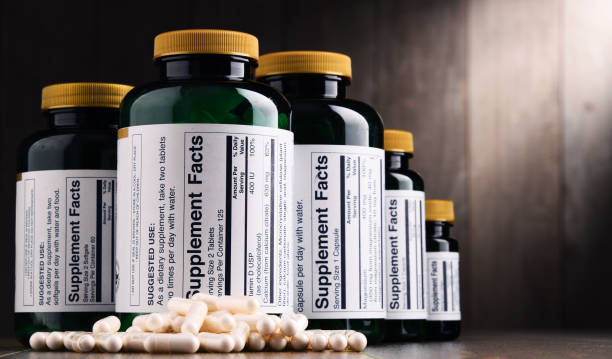 istock Composition with dietary supplement containers. Drug pills 865916310