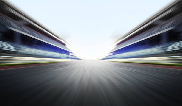 motion blure background with road motion blure background with arena for f1 motor racing track photos stock pictures, royalty-free photos & images
