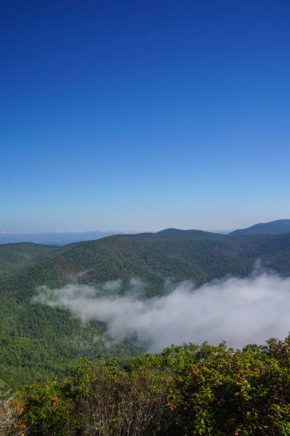 istock Blue Ridge Mountains Rising Above the Clouds in Virginia 865928072