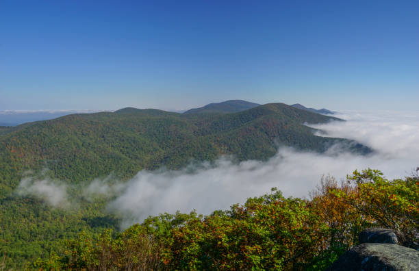 istock Blue Ridge Mountains Rising Above the Clouds in Virginia 865928100