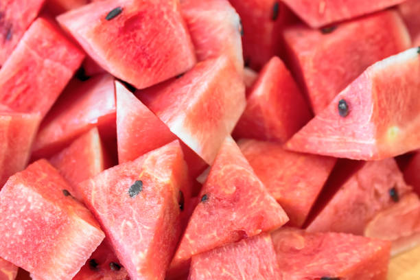 istock Sliced red ripe watermelon. Fruit background and texture 865935154