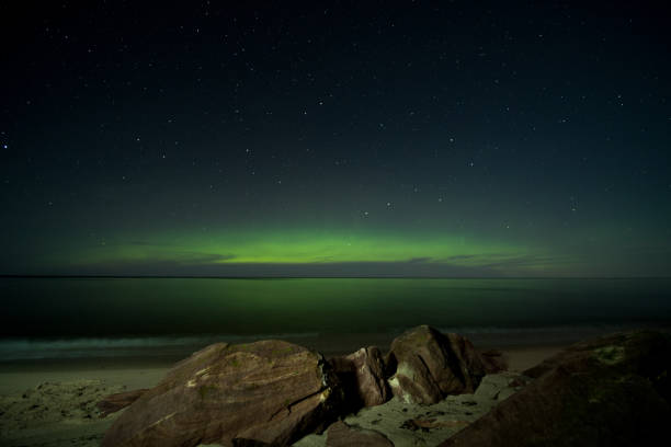 istock Northern Lights Marquette Michigan Beach Rocks Medium 865935588