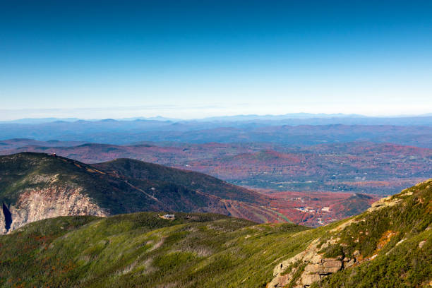 View from summit of Mount Lafayette, looking down Greenleaf trail to a mountain hut. stock photo