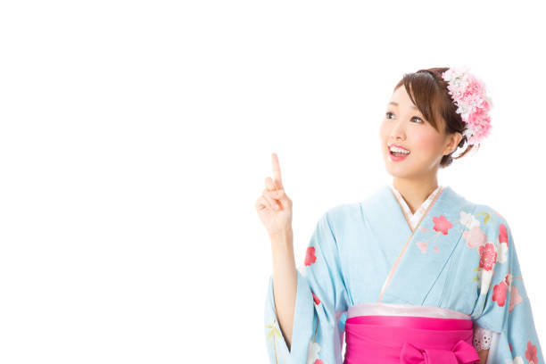 istock attractive asian woman wearing hakama isolated on white background 865939340