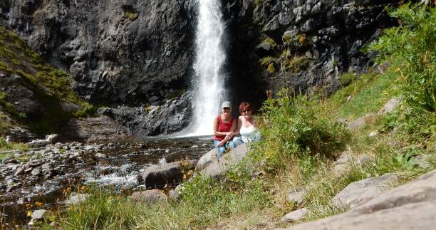 istock We made it to the 90 Ft Conejos Falls! Best friends! 865939618