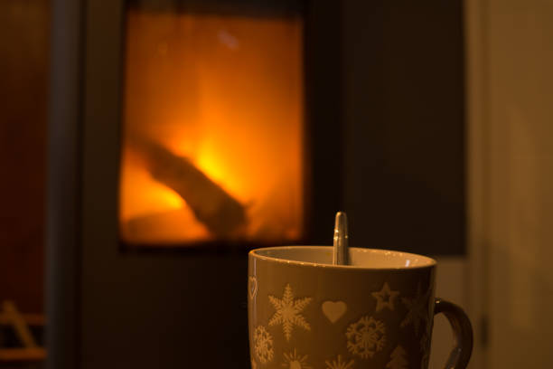 istock one mug of grey and fireplace 865942632